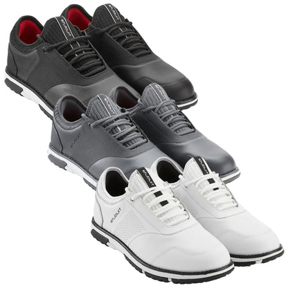 Three pairs of golf shoes are arranged in a stack featuring black grey and white designs with slender laces and textured materials on a white background.