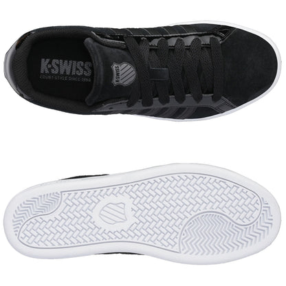 Black athletic shoes are displayed with the top view showcasing laces and a logo while the bottom view reveals a white rubber sole with textured patterns.