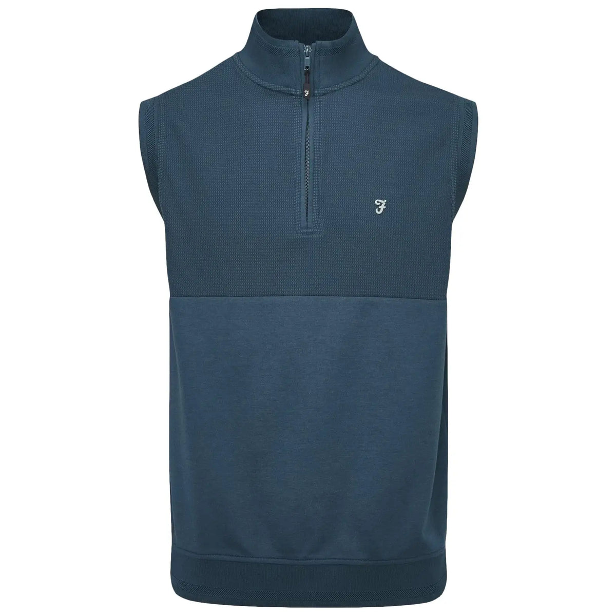 A sleeveless dark blue sweater with a high collar and a quarter-zip front features a textured upper section and a smooth lower section alongside a small logo on the chest.