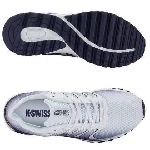 A pair of athletic shoes is displayed from multiple angles showing a white and gray design with a textured sole and laces suggesting readiness for movement in a sports context.