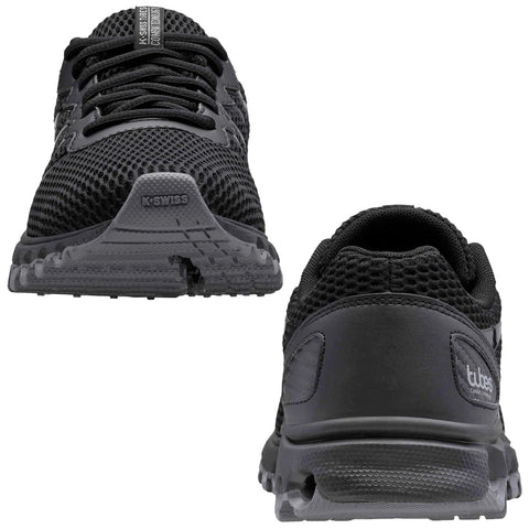 Black athletic shoes are displayed from the front and back angles showcasing their mesh and synthetic design with laces and branding on the sides positioned against a plain background.