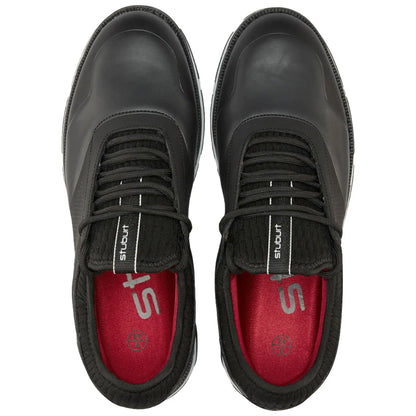 Black athletic shoes are positioned upright showcasing their sleek design with textured sides and black laces set against a red interior, presented on a plain white background.