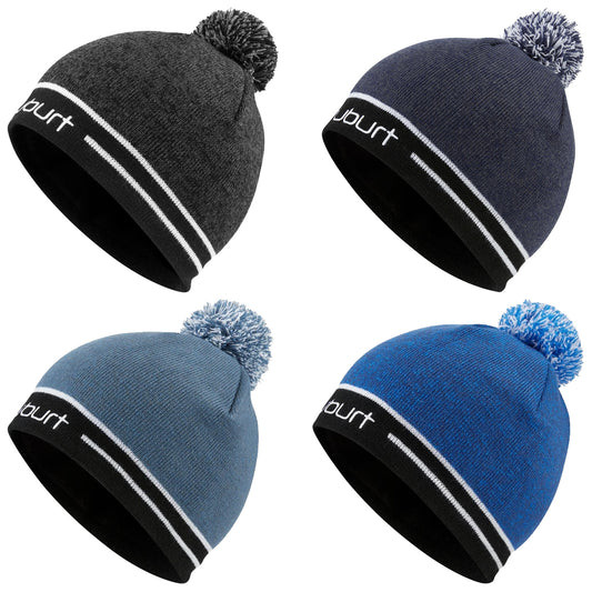 Four knitted beanies are displayed in different colors including gray navy blue light blue and dark blue each topped with a pompom and featuring a black band with the word suburt.