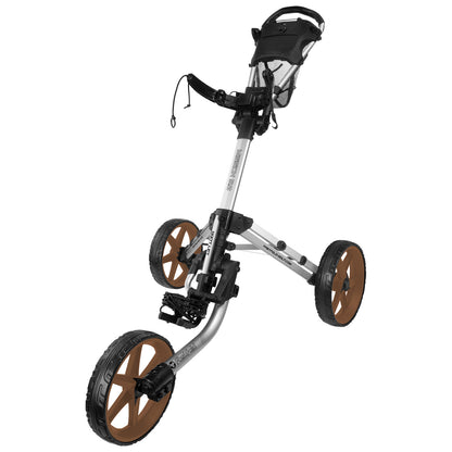 A golf push cart stands upright with three wheels the front two are larger with brown rims and the handle features a mesh cup holder and control mechanisms for maneuvering on a course.