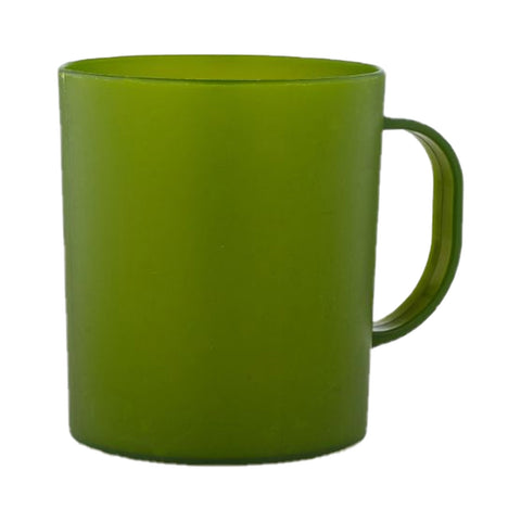 A green plastic mug stands upright with a handle on one side in a neutral background suggesting a simple kitchen or dining setting.