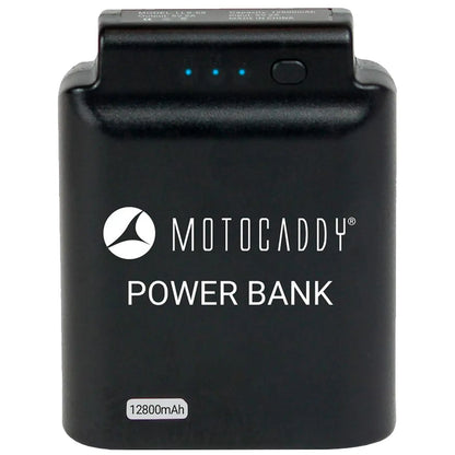 A black power bank labeled Motocaddy with three blue LED indicator lights and a button is shown against a neutral background emphasizing its portable design and capacity of 12800mAh.