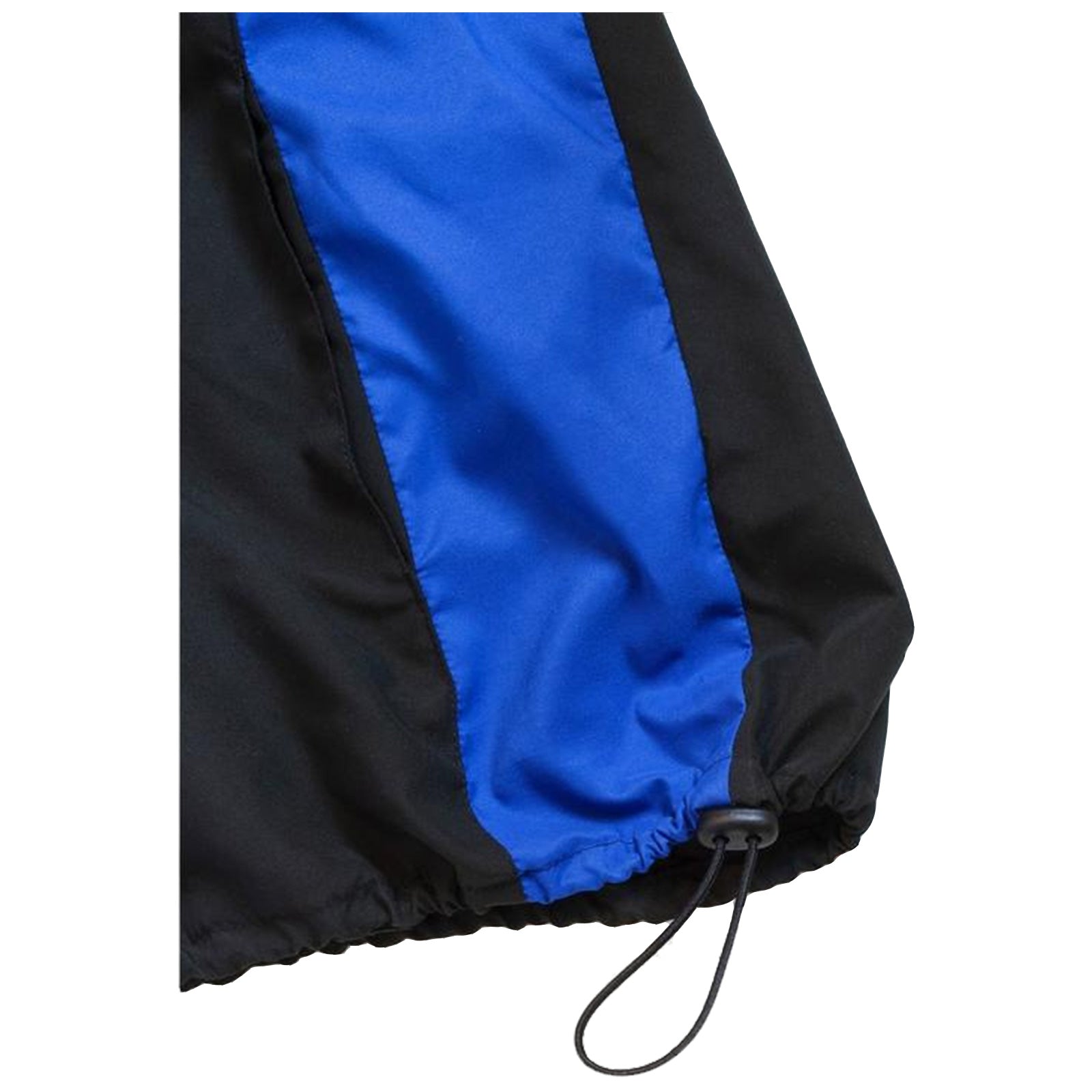 A portion of a garment features a blue panel alongside a black material with a gathered hem and a drawstring to adjust the opening in a casual clothing context.