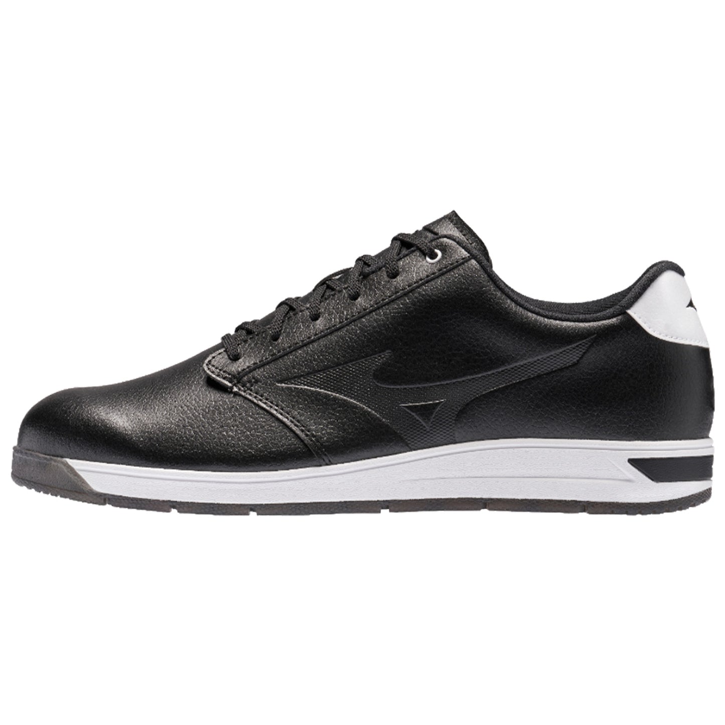 A black athletic shoe stands sideways displaying a smooth leather upper with a white sole and heel accent showcasing a sleek design suitable for sports or casual wear.