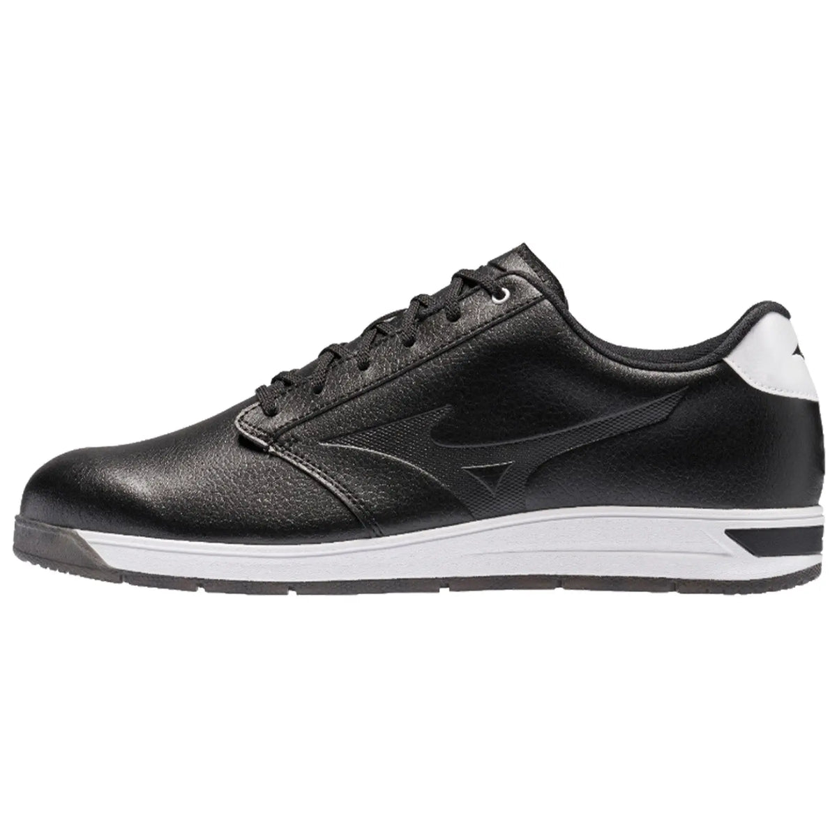 A black athletic shoe stands sideways displaying a smooth leather upper with a white sole and heel accent showcasing a sleek design suitable for sports or casual wear.