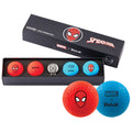 A set of three colorful golf balls is displayed in a black box. The balls feature Spider-Man designs and branding from Volvik, indicating a Marvel collaboration for themed golfing.