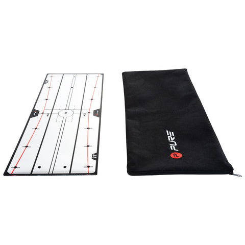 A rectangular training mat displays straight lines and markers for alignment placed beside a black carrying pouch featuring a logo indicating the brand Pure in a neutral background.
