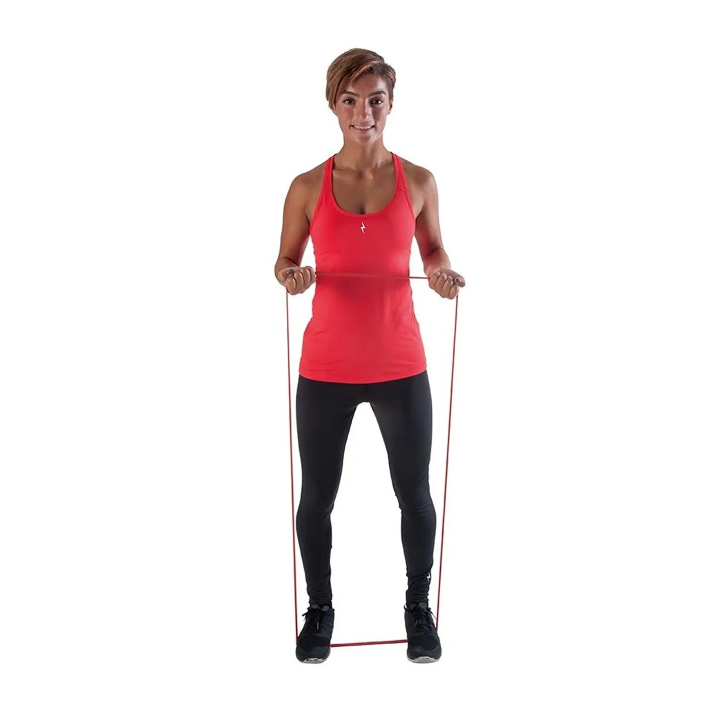 A woman stands upright holding a resistance band with both hands the band is stretched between her hands showing an exercise posture the background is plain white
