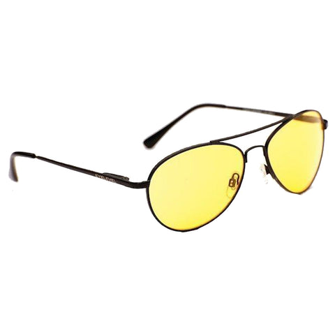 A pair of yellow-tinted sunglasses rests in an upright position showcasing their black metal frames and large oval lenses designed for reducing glare and enhancing visibility in bright environments.