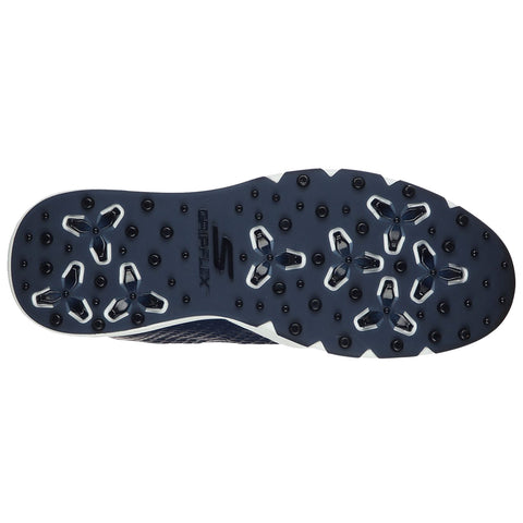 A navy athletic shoe sole is displayed featuring various traction elements designed for grip on surfaces. The context suggests usage in sports or outdoor activities.