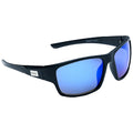 Sunglasses with a black frame and blue-tinted lenses are positioned at an angle showcasing their design and color in a bright and neutral environment